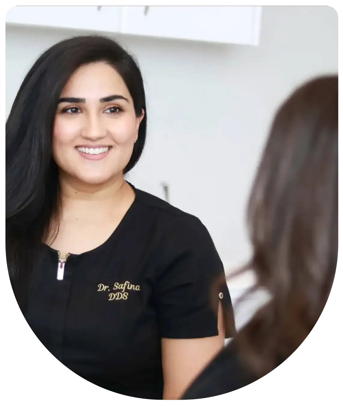 Dr. Safina Jetha-Kurji with a patient